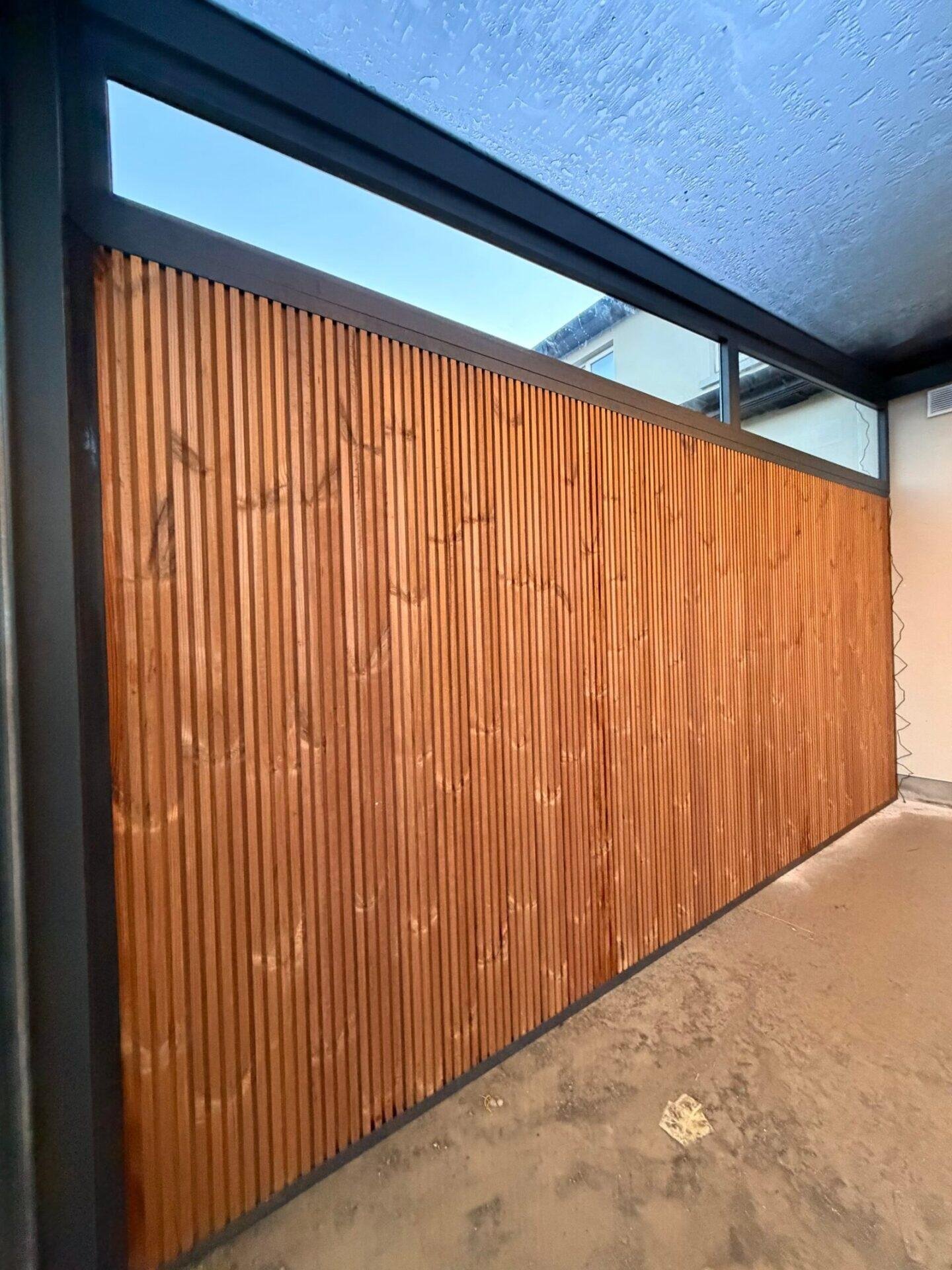 Glass veranda with sliding doors attached to a house in Drogheda