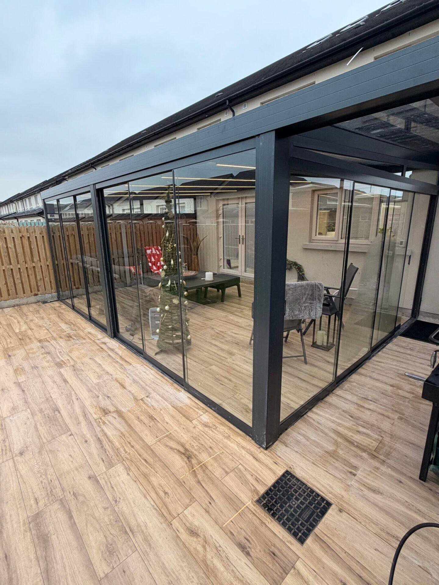 Pergola veranda glass roof seen from the patio